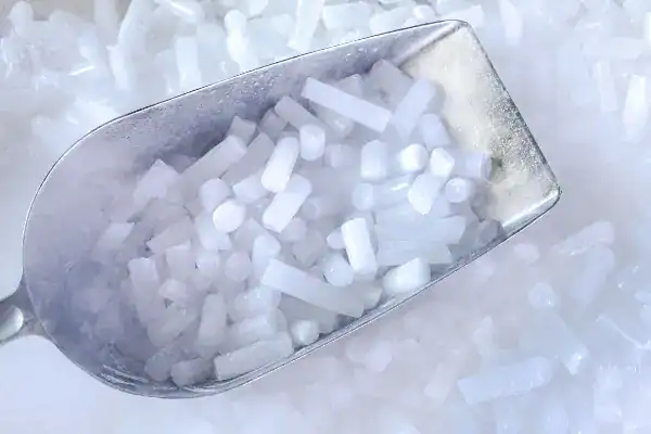 A scoop with dry ice pellets