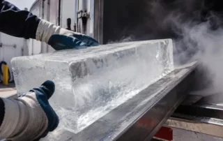 Worker loading a block of ice